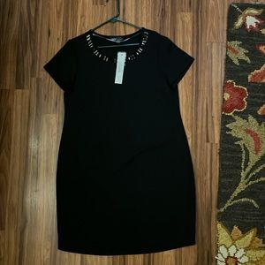 Short sleeve black dress with jewel detail. Size extra large.